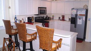 Condo, 3 Bedrooms | Private kitchen | Fridge, microwave, dishwasher, coffee/tea maker