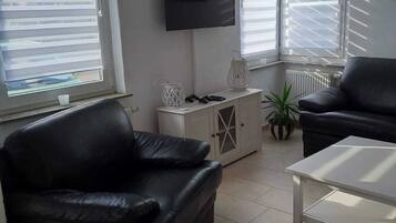 Flachbildfernseher, Kamin, Videospielkonsole