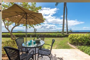 Outdoor dining - Remodeled Oceanview Townhome Luxurious End-Unit w/ Stunning View and Pool Access (Koloa)