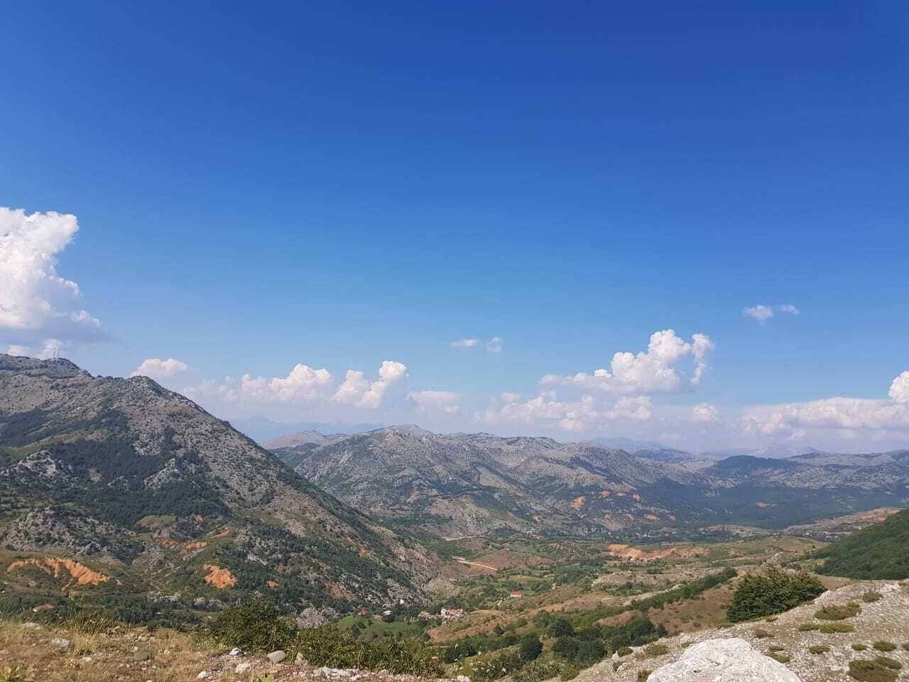 A mountainous landscape with a clear sky.