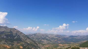 A mountainous landscape with a clear sky.