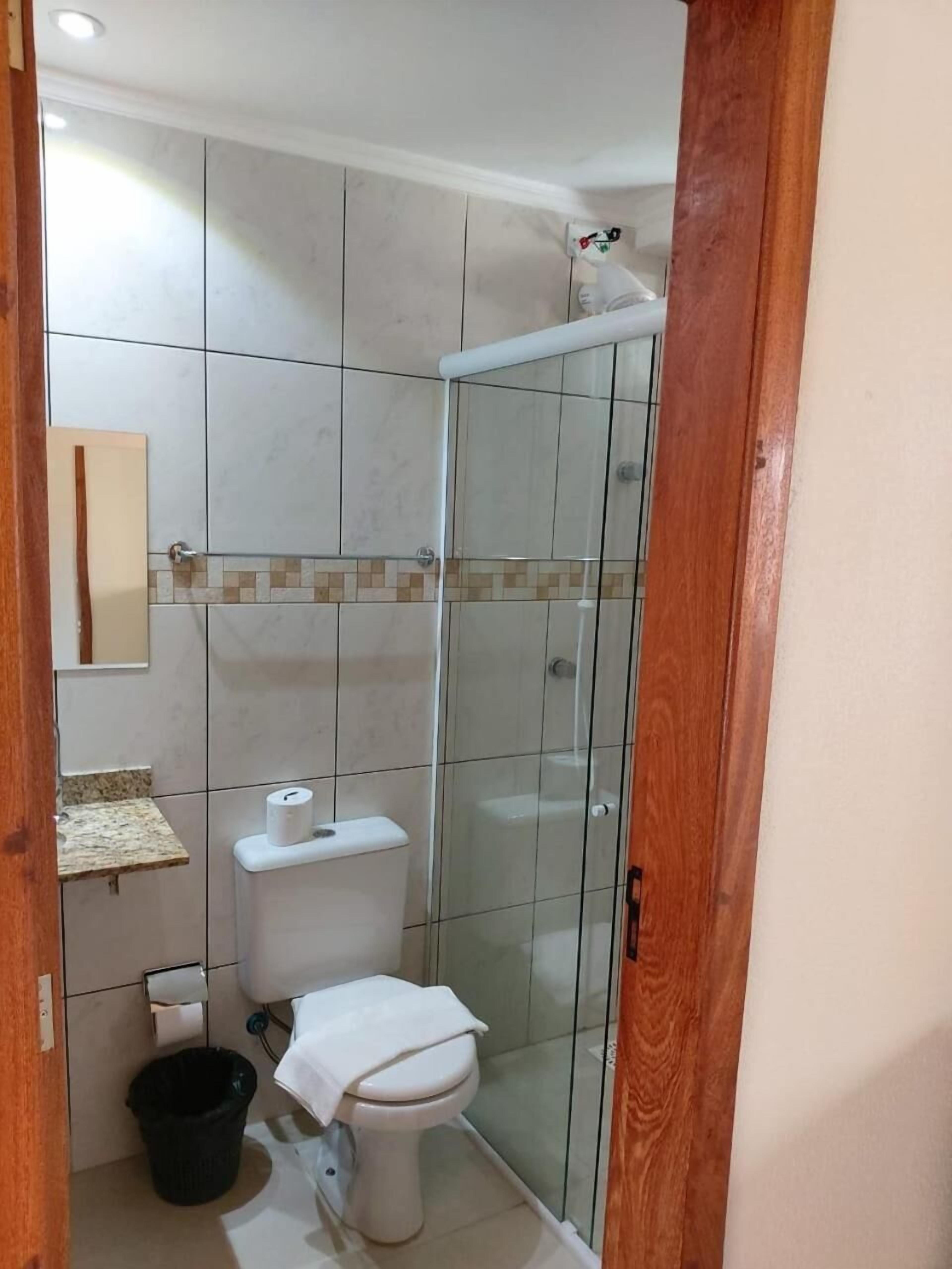 shower, towels, toilet paper