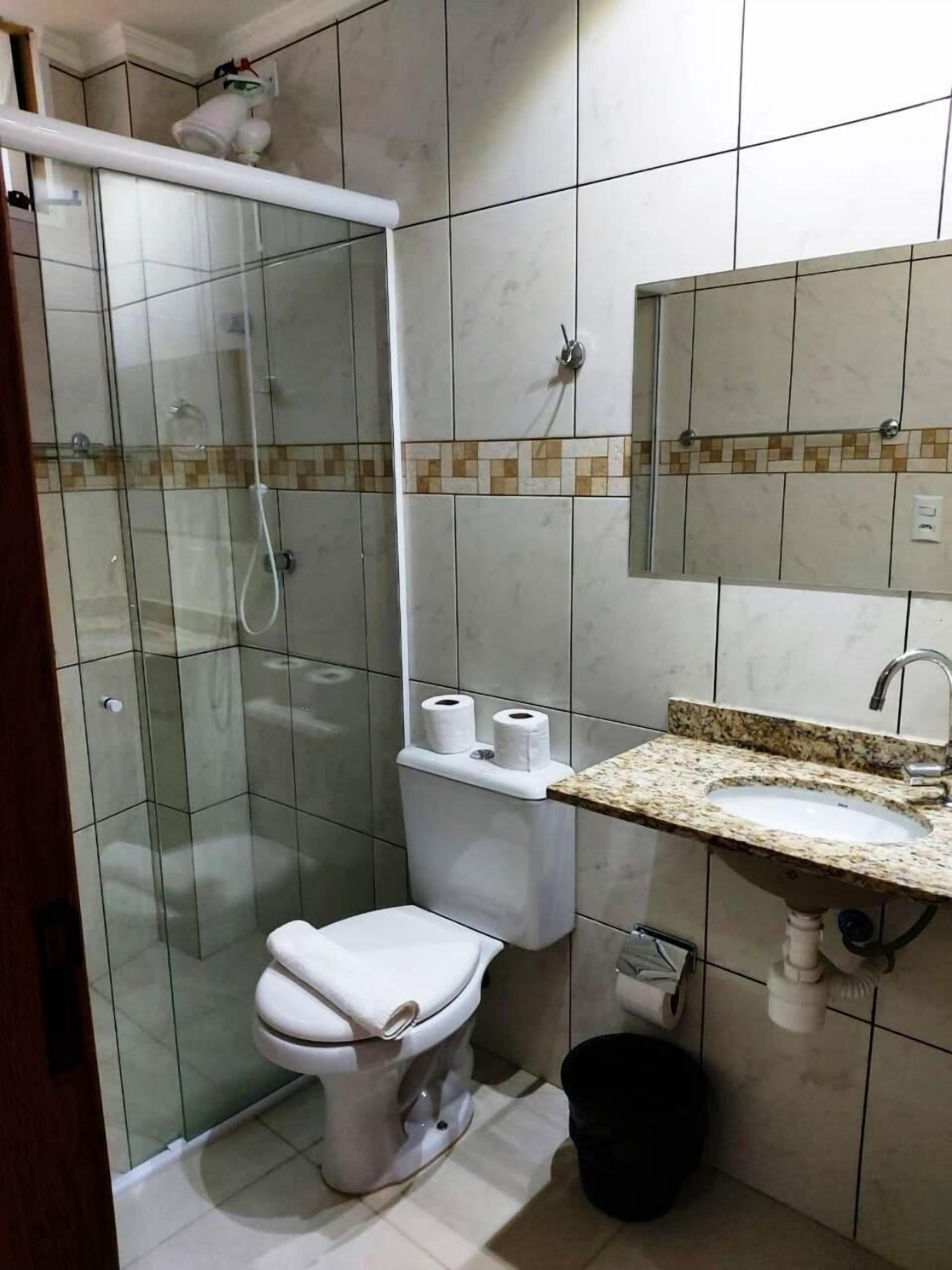 shower, towels, toilet paper