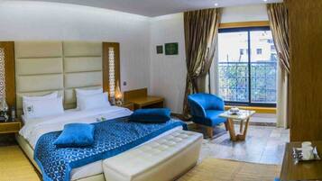 Egyptian cotton sheets, premium bedding, down comforters, free minibar