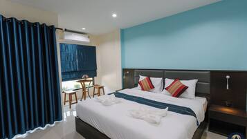 Quarto luxo | Cortinas blackout, Wi-Fi de cortesia, roupa de cama