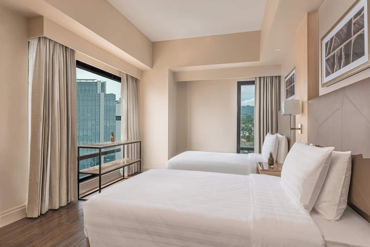 Habitación Deluxe, 2 camas individuales | 1 habitación, minibar y caja de seguridad en la habitación