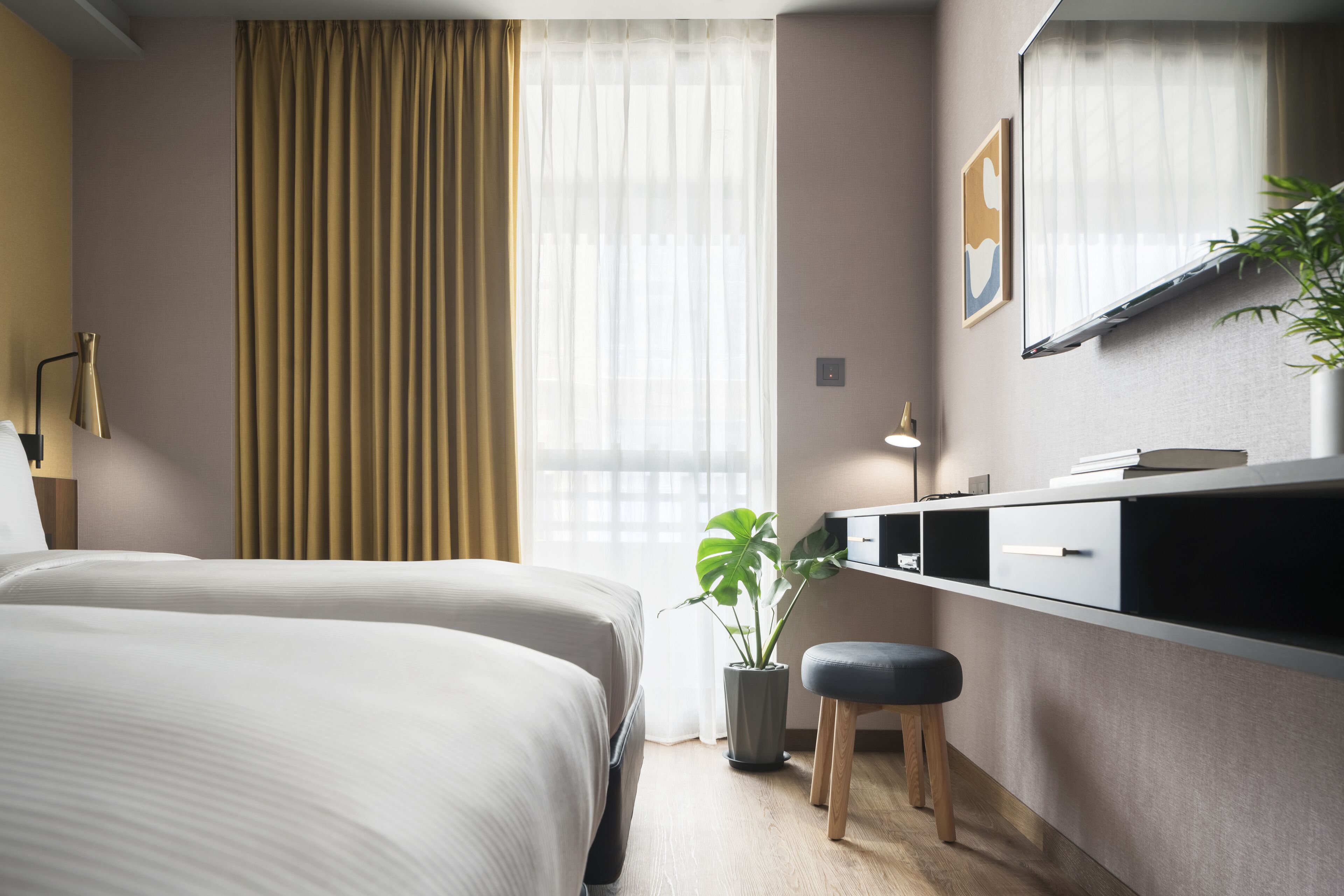 comfort twin room | premium bedding, down duvets, desk, laptop workspace