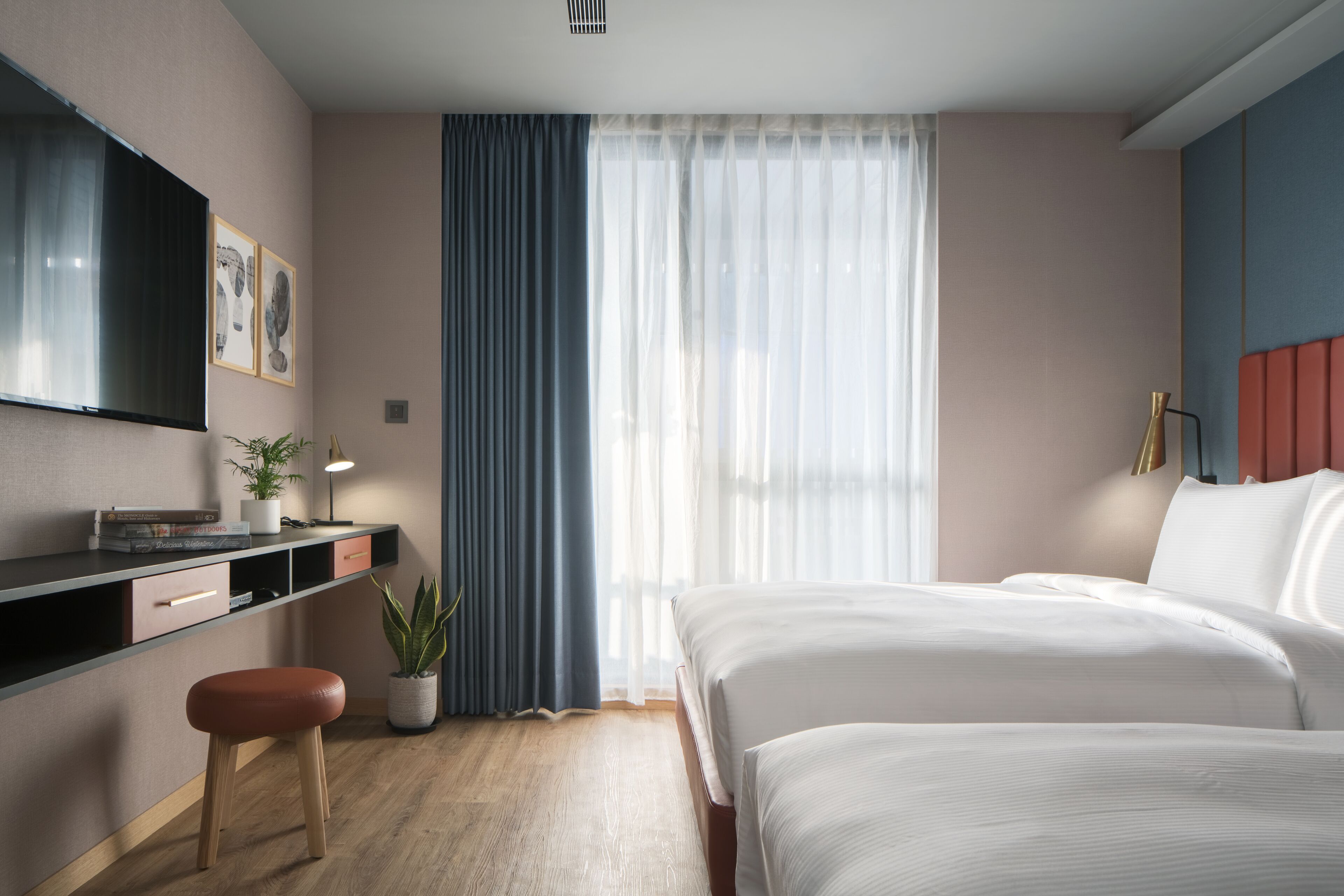 elite triple room | premium bedding, down duvets, desk, laptop workspace