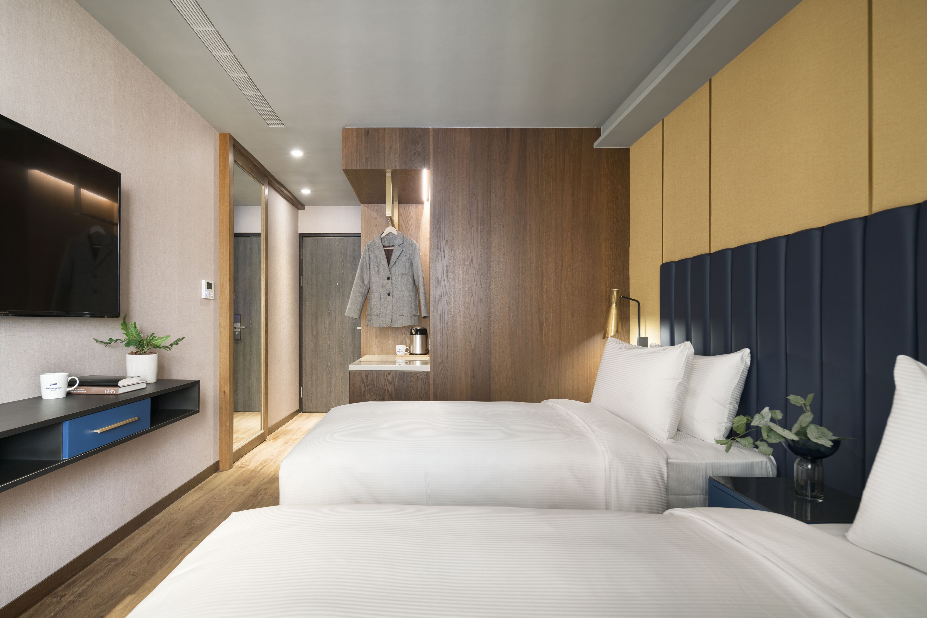 comfort twin room | premium bedding, down duvets, desk, laptop workspace