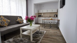 Apartamento City | Sala de estar
