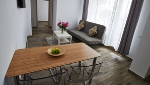 Apartamento City | Sala de estar
