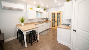 Coffee/tea maker, fridge, microwave, oven