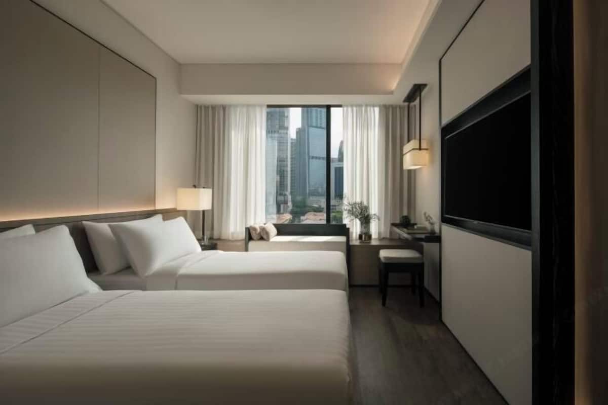 Free minibar, in-room safe, blackout curtains, iron/ironing board