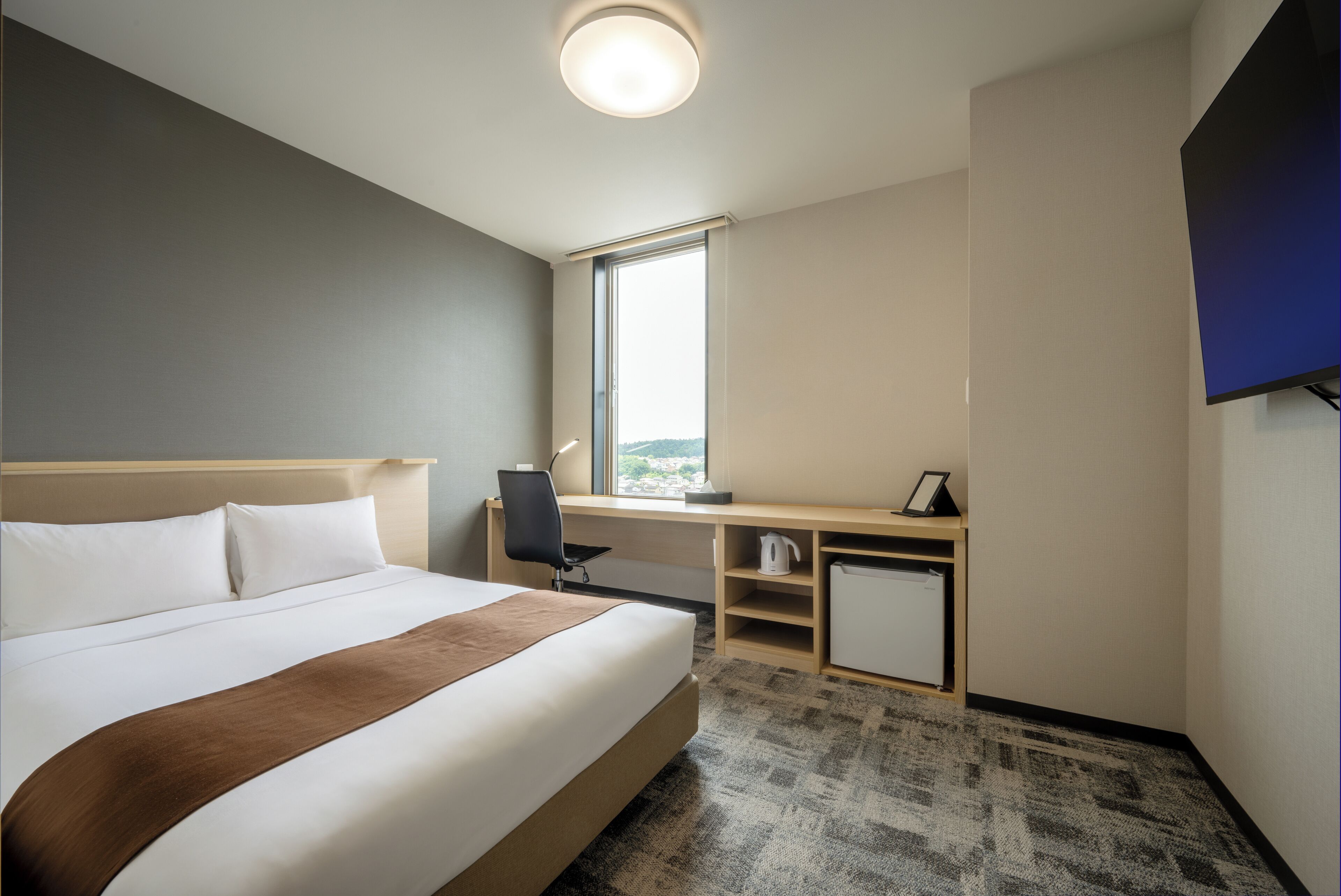 Standard-dobbeltværelse | Premium-sengetøj, skrivebord, arbejdsområde til bærbare computere