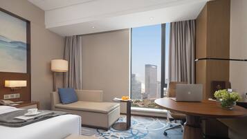 Down duvets, pillow-top beds, in-room safe, desk