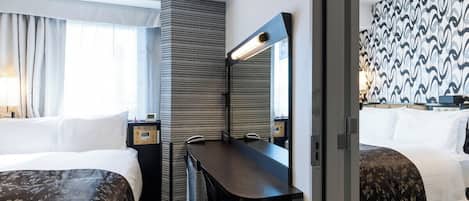 Down comforters, blackout drapes, iron/ironing board, free WiFi