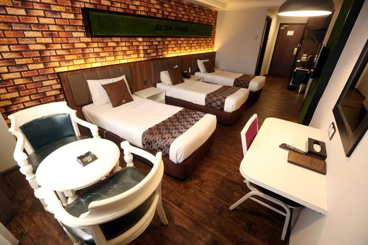 Deluxe Triple Room | In-room safe, blackout drapes, soundproofing, iron/ironing board