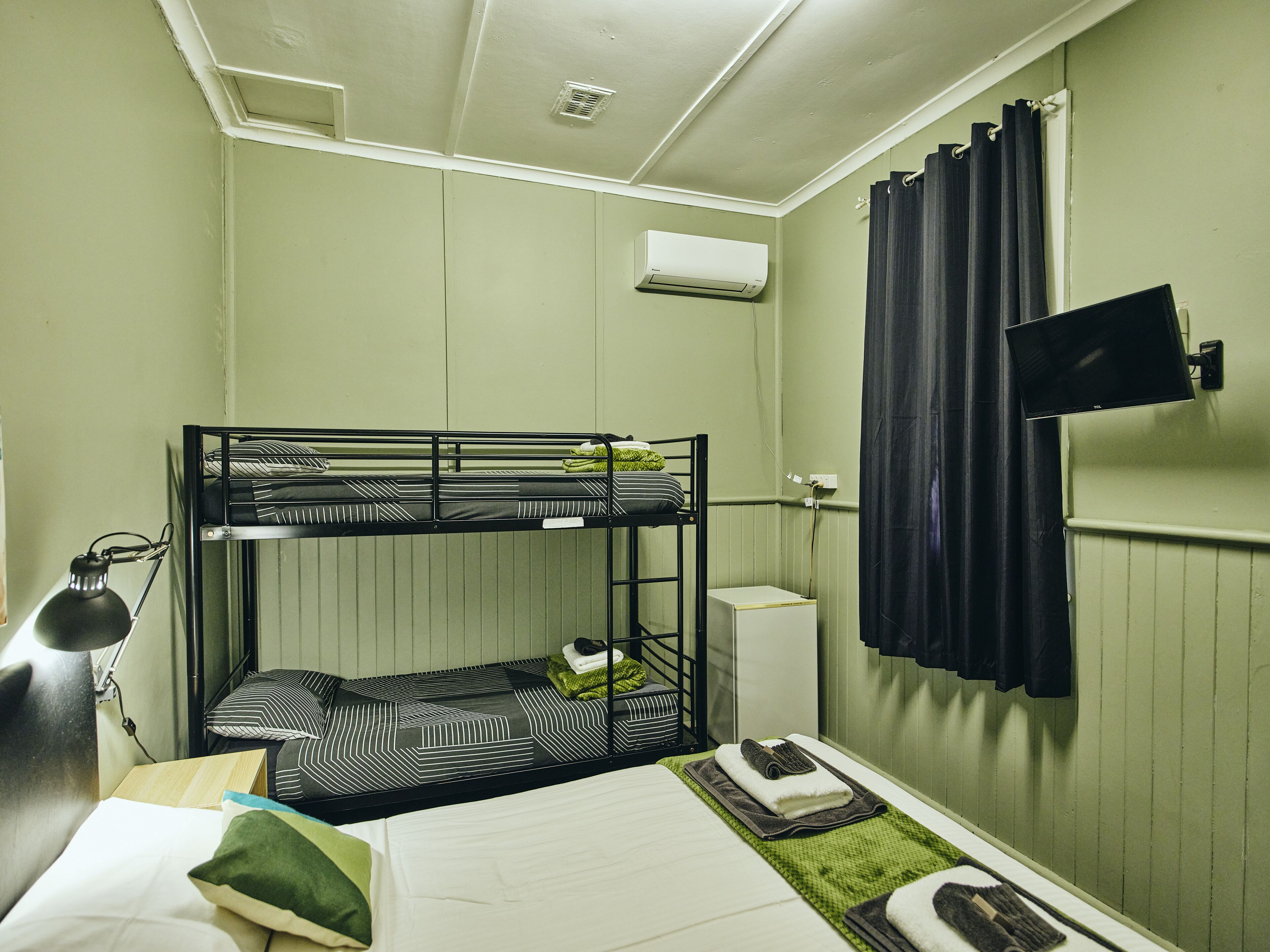 family room, shared bathroom | blackout curtains, free wifi, bed sheets