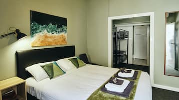 Family Suite, Private Bathroom | Blackout curtains, free WiFi, bed sheets