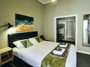 Family Suite, Private Bathroom | Blackout drapes, free WiFi, bed sheets - Black Diamond Lodge (Collie)