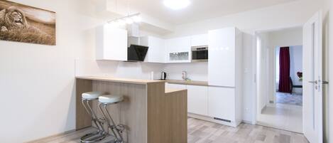 Microwave, dishwasher, cookware/dishes/utensils