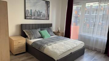 2 dormitorios, tabla de planchar con plancha, wifi y ropa de cama