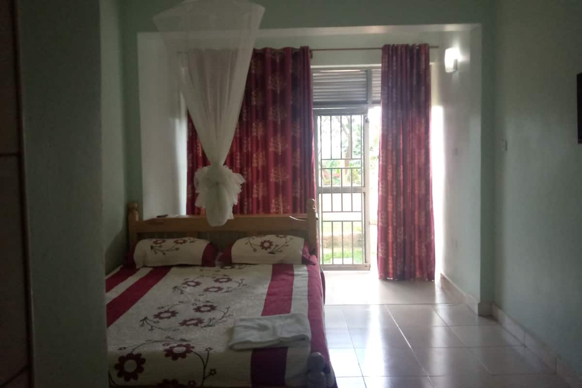 Laptop workspace, blackout drapes, soundproofing, iron/ironing board