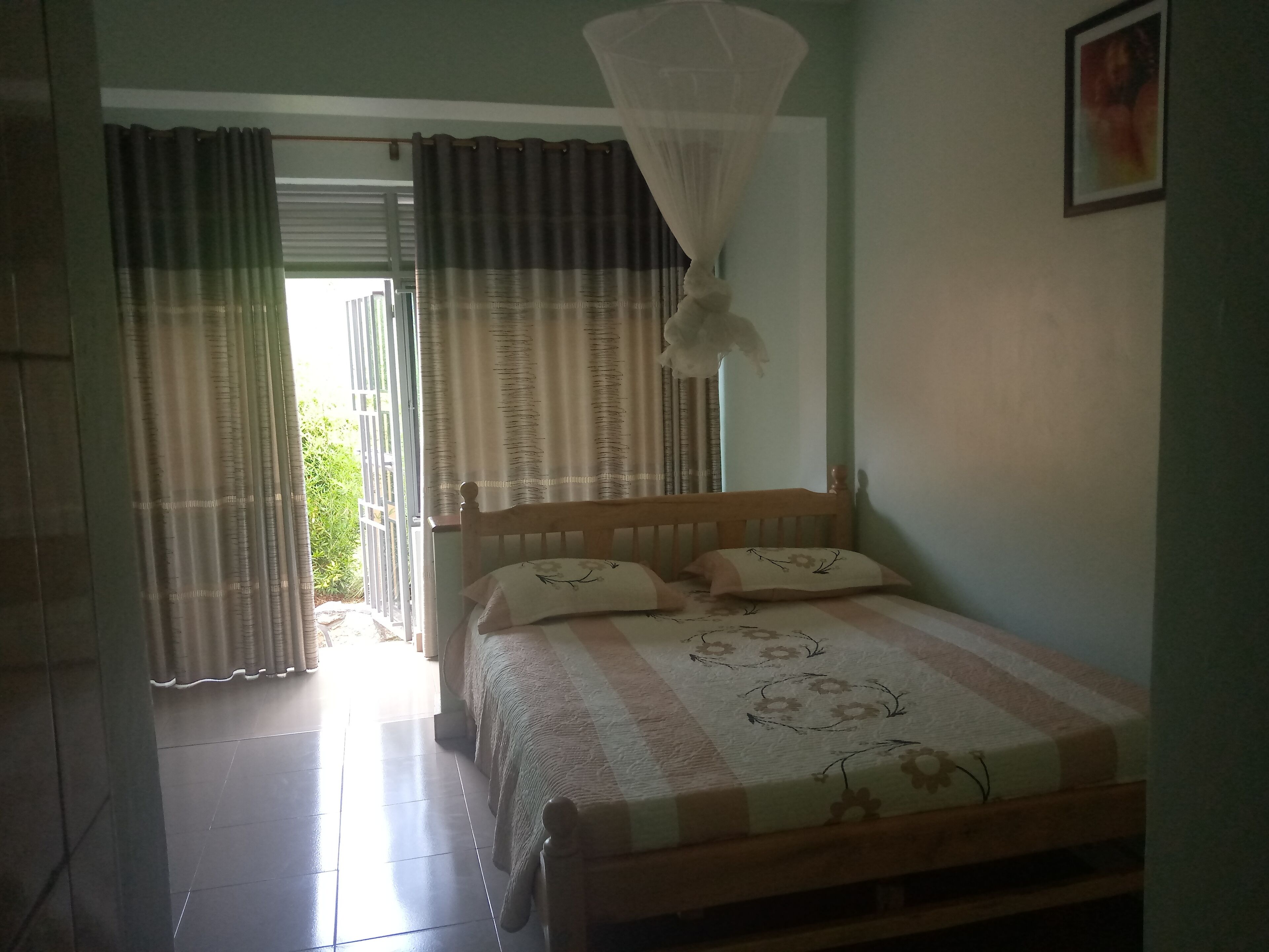 Laptop workspace, blackout drapes, soundproofing, iron/ironing board