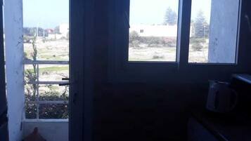 Apartment, 1 Bedroom | Private kitchen | Fridge, microwave, oven, stovetop