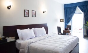 Minibar, caja de seguridad en la habitación y cortinas blackout 