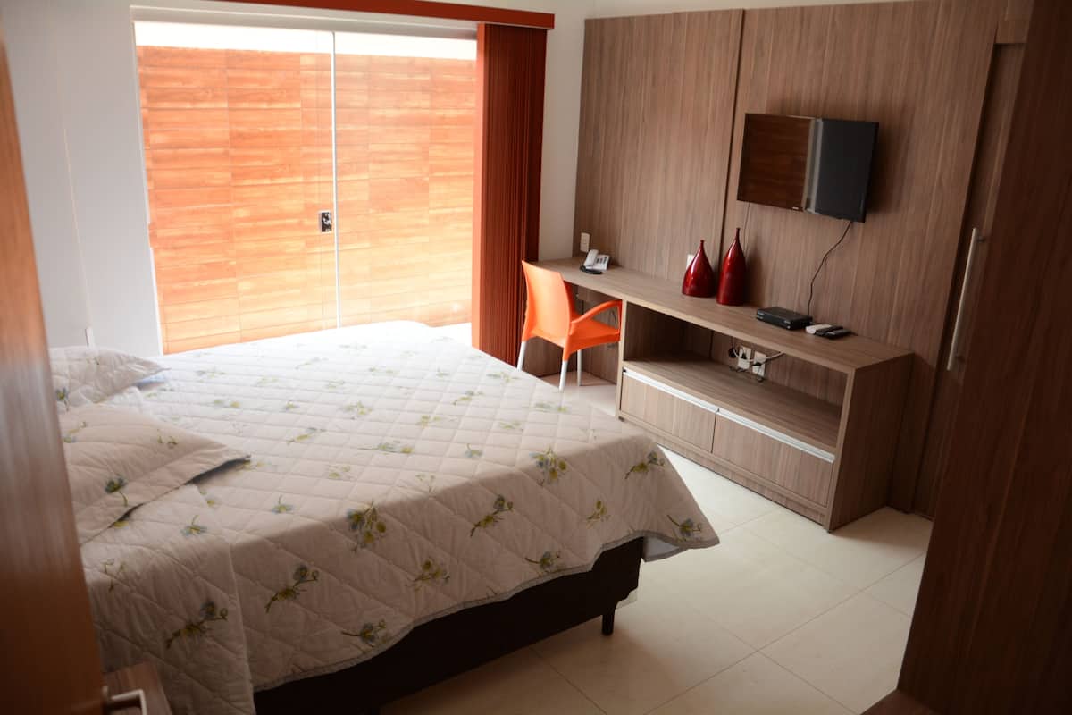 Studio Suite Deluks | Minibar, tirai kedap cahaya, setrika/meja setrika, dan Wi-Fi gratis