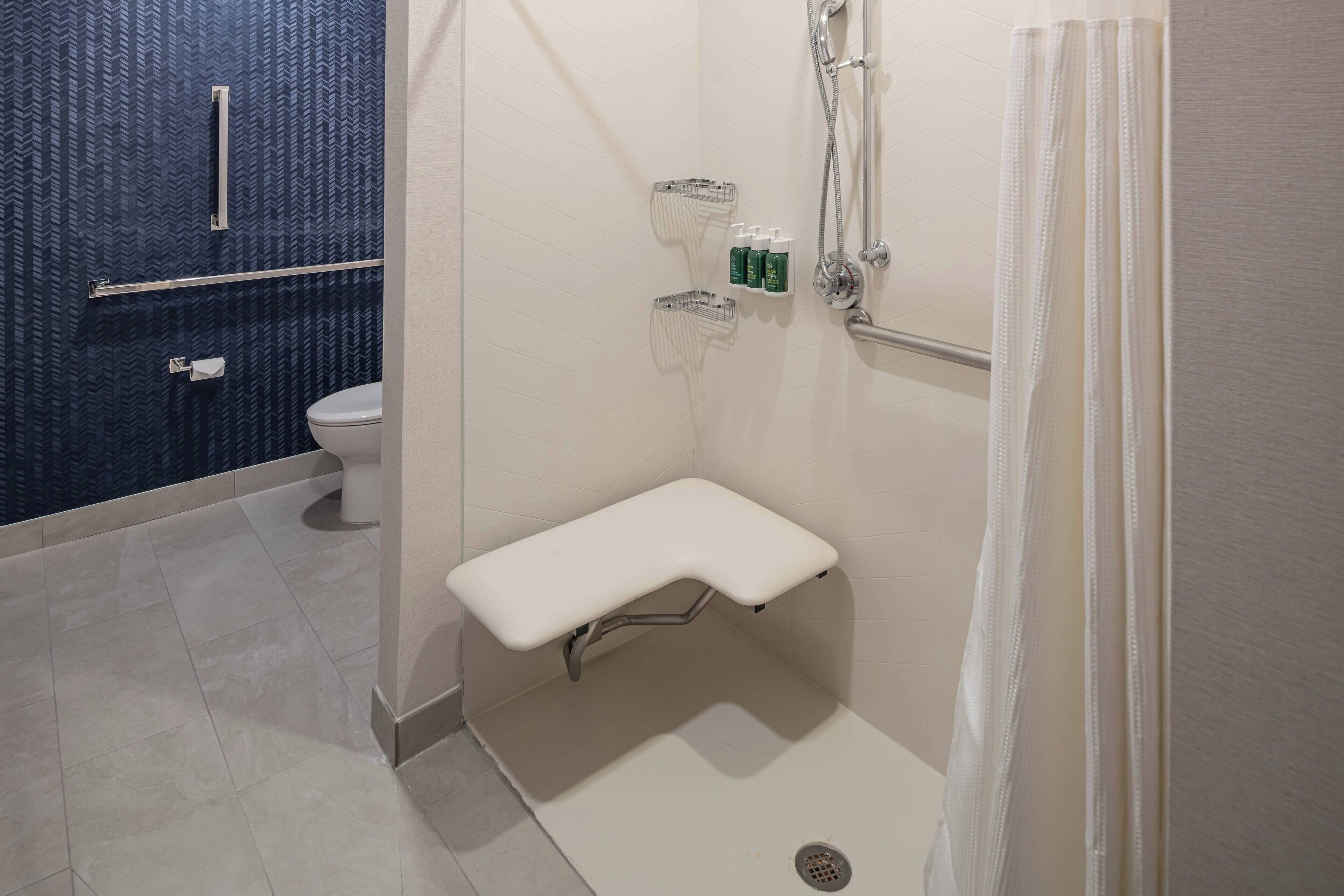 combined shower/bathtub, free toiletries, hair dryer, towels