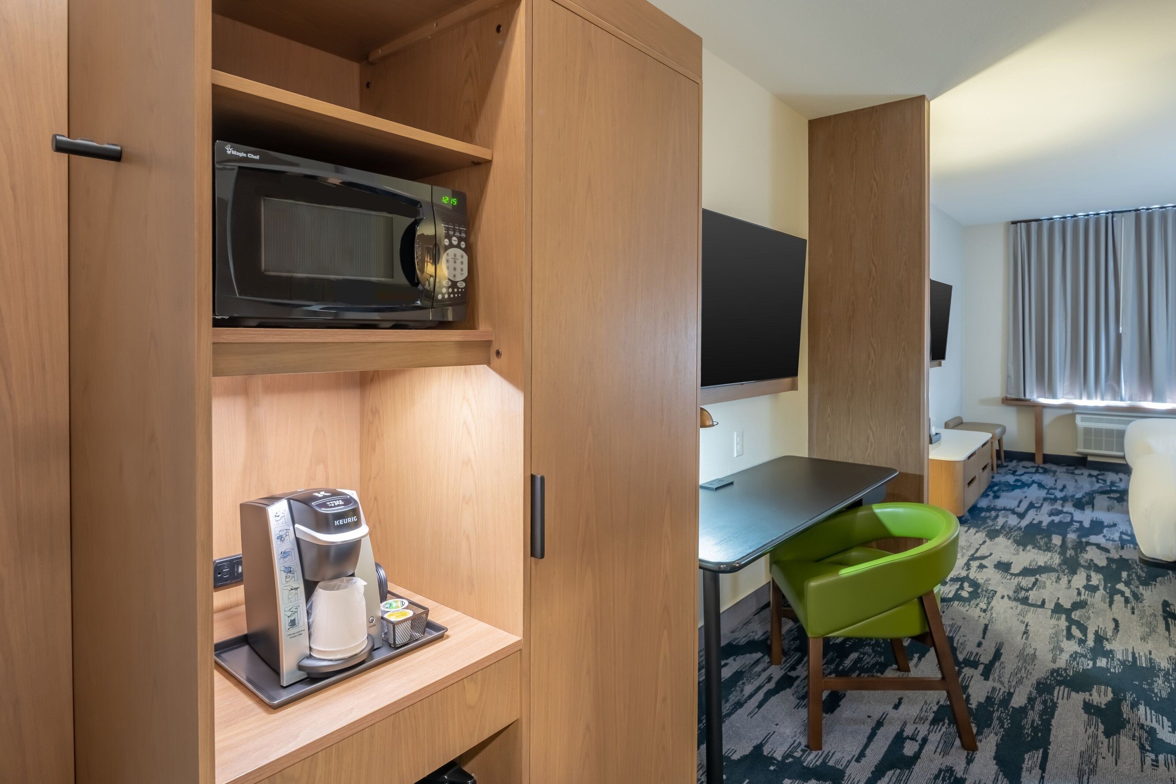 desk, laptop workspace, iron/ironing board, free cots/infant beds