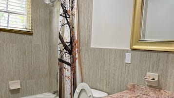 Combined shower/tub, towels, soap, toilet paper