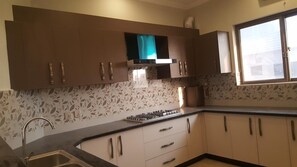 Fridge, microwave, stovetop, cookware/dishes/utensils