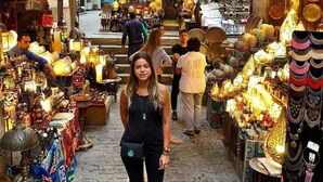 A narrow street with shops on both sides selling various items. - Sunset Hotel Cairo - Hostel (Cairo)