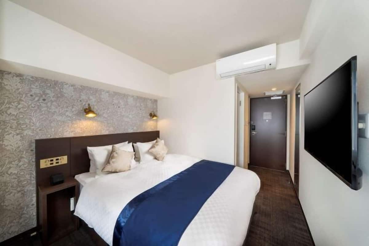 Desk, laptop workspace, blackout curtains, free WiFi