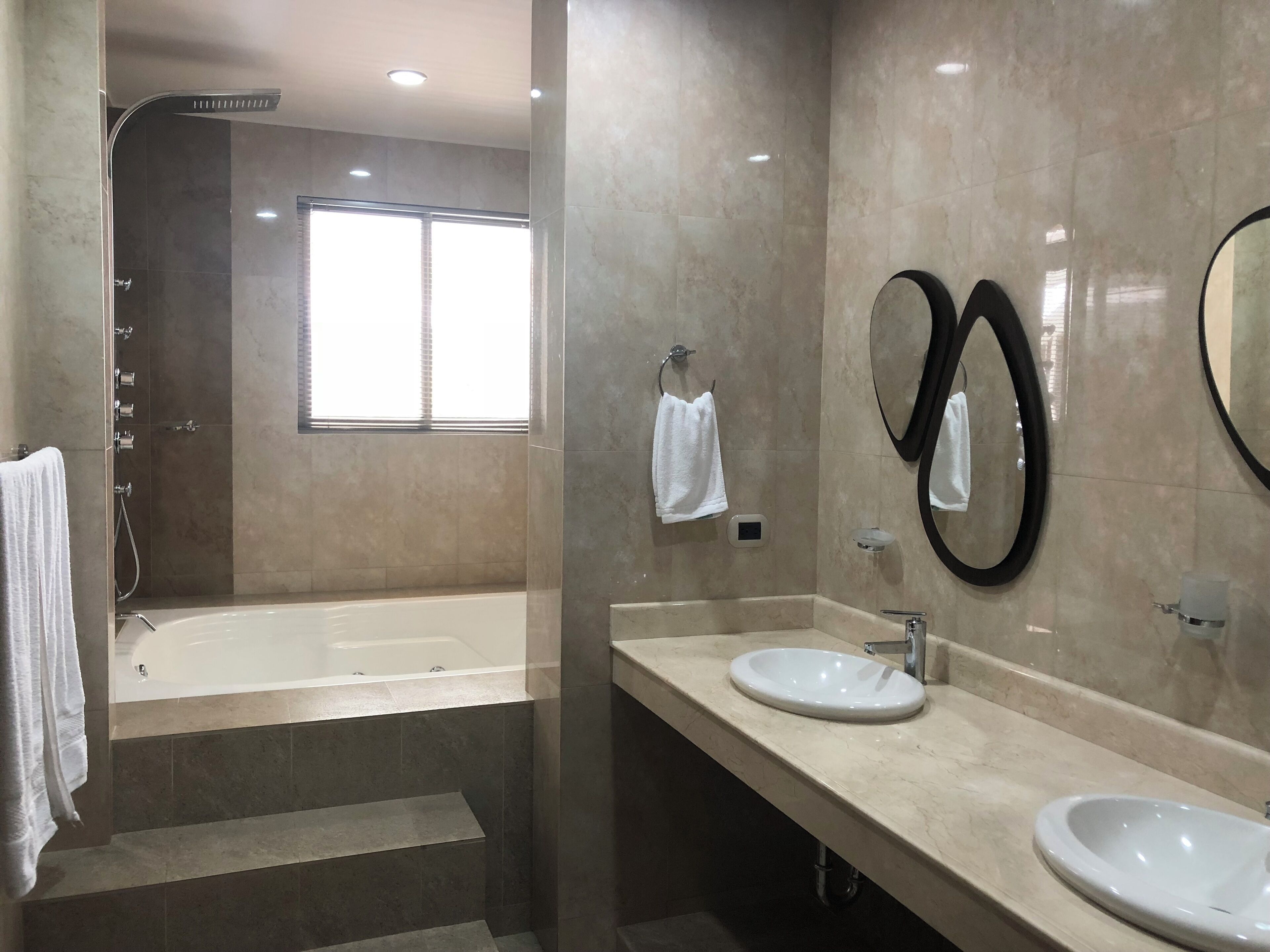 Shower, jetted tub, towels, soap