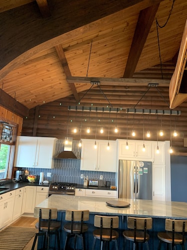 WELCOME TO ON THE ROCK - A RECENTLY RENOVATED  BEAUTIFUL LAKE FRONT HOME