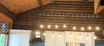 WELCOME TO ON THE ROCK - A RECENTLY RENOVATED BEAUTIFUL LAKE FRONT HOME