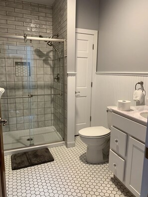 Bathtub, jetted tub, hair dryer, towels