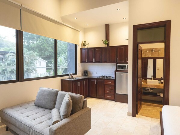 Studio | Living area | 32-inch flat-screen TV with cable channels, TV - Surfside Apartments Playa Carmen (Cóbano)