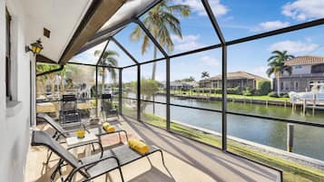 House, Multiple Beds (Quiet waterfront home with pool, dock) | Terrace/patio