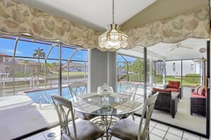 House, Multiple Beds (Quiet waterfront home with pool, dock) | Dining