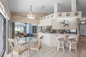 House, Multiple Beds (Quiet waterfront home with pool, dock) | Dining