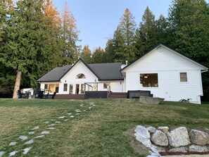 Enjoy the large grassy backyard.