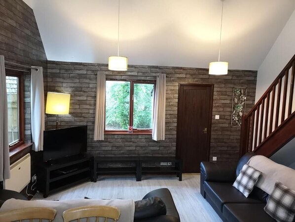 Chalet | Sala de estar | Televisión de pantalla plana 