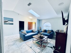 Smart TV, fireplace, table tennis, books