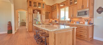 BEAUTIFUL WATERFRONT HOME WITH BOATHOUSE AND HUGE PORCHES!