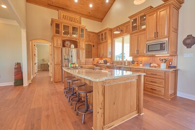 BEAUTIFUL WATERFRONT HOME WITH BOATHOUSE AND HUGE PORCHES!